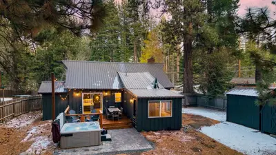 a green tiny house with a tub in the yard at Westlake Cabin by AvantStay Hot Tub Near Skiing Walk to Restaurants Lake in Tahoe City