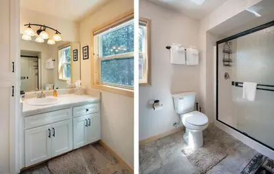 two pictures of a bathroom with a toilet and a shower at 11N Margaret in North Wawona