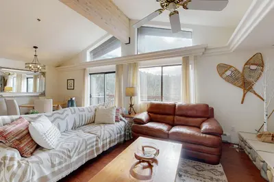 a living room with a couch and a chair at Bear-foot Retreat in Incline Village