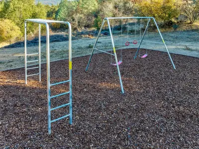 two empty swingsacersacersacersacersacersngthythonythonython at Luxury Lodge-Hot Tub-BBQ-Sleeps 18 in Oakhurst