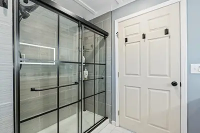 a walk in shower with a glass door at 4000 SF, 20 Acre Gated Luxe Estate, Game Room, Pano View, Pool, Spa in Coarsegold