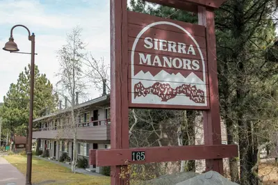 a sign for a siberia manors motel in front of a building at Sierra Manors #61 condo in Mammoth Lakes