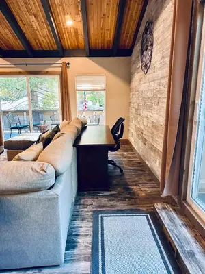 a room with a couch and a desk in a house at Lake Tahoe Incline Beach Ski Pool Pets Casino in Incline Village