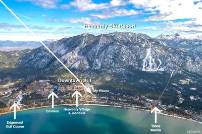 a view of a mountain with a view of a lake at 3987 - Upscale Townhouse Walk to Heavenly, Casino and Beach in South Lake Tahoe
