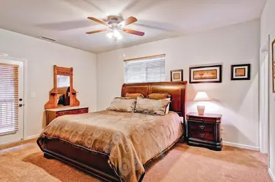 a bedroom with a bed and a ceiling fan at Eagles Nest in Yosemite West