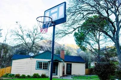 a basketball hoop in front of a house at 3B Hot Tub, 4mi from Sequoia, Arcade Games, Foosball in Three Rivers