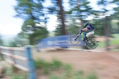 a man riding a bike on a dirt road at Getaway at Gold Bend in Ponderosa Fairway Estates