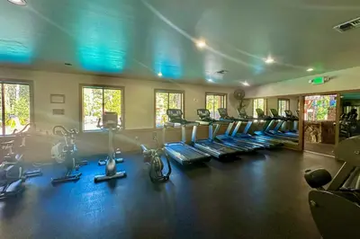 a gym with a bunch of cardio equipment in it at Northstar Retreat in Kingswood Estates