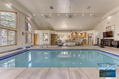 a large swimming pool in a large house at 6000 sqft Pine House with indoor swimming pool in Reno