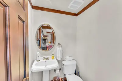 a bathroom with a white toilet and a sink at 3-Level Incline Village Retreat with Fireplace in Incline Village