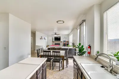a kitchen and dining room with a table and chairs at Family Reno Home with Game Room! 28 Mi to Ski Resort in Reno