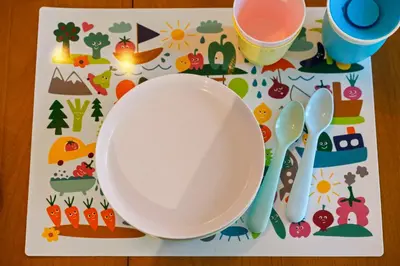 a plate and spoons on a tray on a table at Cozy Reno Midtown Retreat Fire Pit & Parking in Reno