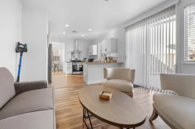 a living room with a couch and a table at 4 bedroom Home in Tracy 2 Minutes to Highway in Tracy