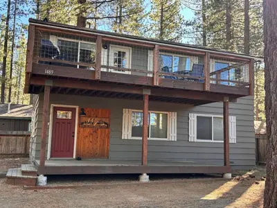 a tiny house with a balcony and a deck at Ormsby House 1489O in South Lake Tahoe