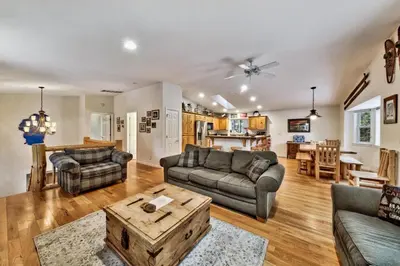 a living room with a couch and a table at Kamp Koyukon 1939K in South Lake Tahoe