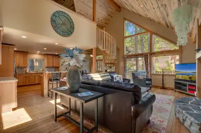a living room with a couch and a table at The Westlands Lodge 1135AC in South Lake Tahoe