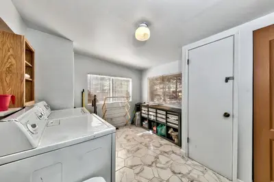 a kitchen with a sink and a dishwasher at 1577A The Tahoe Lazy Bear in South Lake Tahoe