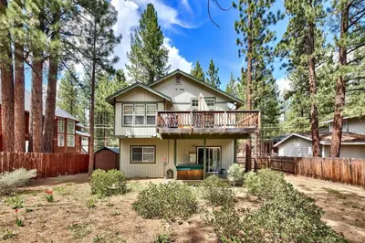 a house with a deck on top of it at 1144GB The Golden Bear Retreat in South Lake Tahoe