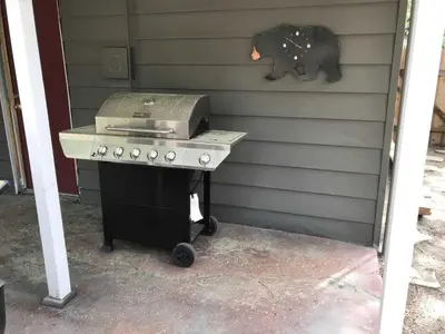 a grill sitting on a table next to a wall at 1625A Atroari Chalet in South Lake Tahoe