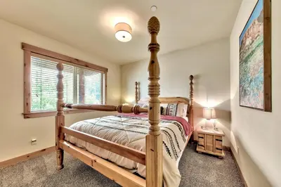 a bedroom with a bed and a window at 1376MD Angora View in South Lake Tahoe