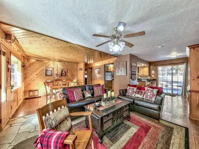 a living room with a couch and a table at 2556H Lazy Bear's Den in South Lake Tahoe
