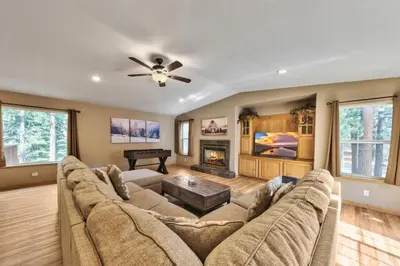 a living room with a couch and a fireplace at 1213GB Golden Bear Tahoe Home in South Lake Tahoe
