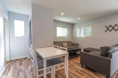 a living room with a table and a couch at RR-Birch_Creek 2 in June Lake