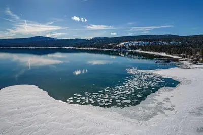 an aerial view of a lake in the snow at Lake Tahoe Getaway Close to Beach & Ski Slopes in Tahoe City