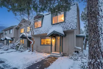 a house covered in snow in the yard at Lake Tahoe Getaway Close to Beach & Ski Slopes in Tahoe City