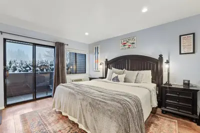 a bedroom with a large bed and a window at Lakeland Studio - Walk to Casinos, Restaurants And Gondola in South Lake Tahoe