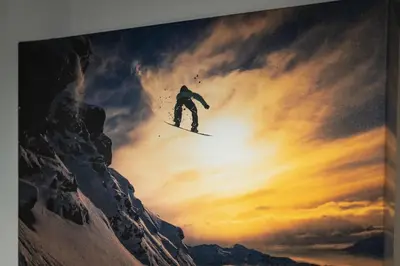 a man flying through the air while riding a snowboard at Lakeland Studio - Walk to Casinos, Restaurants And Gondola in South Lake Tahoe