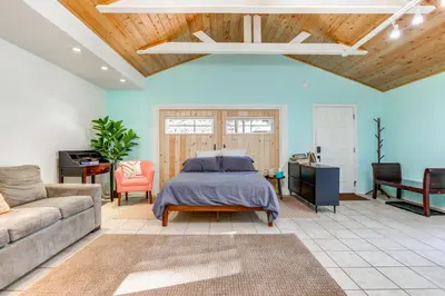 a bedroom with a bed and a couch at Drive to Major Parks Nature Getaway in West Point in West Point