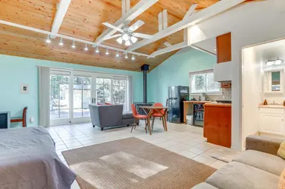a kitchen and living room with a bed and a table at Drive to Major Parks Nature Getaway in West Point in West Point