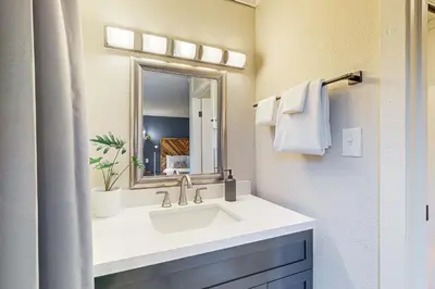 a bathroom with a sink and a mirror at Lakeside Life in Tahoe Vista
