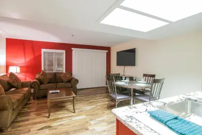 a living room with a couch and a table at North Lake Lodges & Villas in Incline Village