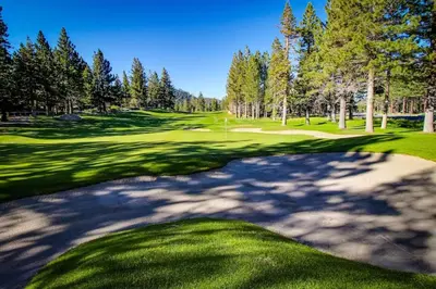 a view of a golf course with a green at Meadow Ridge 44 in Mammoth Lakes