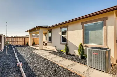 a house with a heater in front of it at 15 Mi to Dtwn Sacramento Newly Built Home! in Sacramento