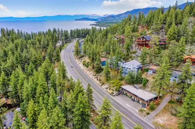 an aerial view of a resort with a road and a lake at Experience the Beauty of Tahoe from Your Zephyr Cove Retreat! #2 in Zephyr Cove