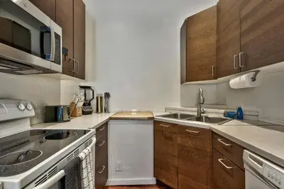 a kitchen with a sink and a dishwasher at Zephyr Cove first level 1 Bed: close to everything bike, ski, swim! in Zephyr Cove