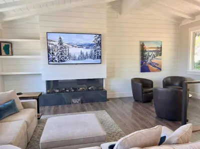 a living room with a fireplace and a tv at Lake Tahoe Vacation Rental Fireplace and Balcony in Incline Village