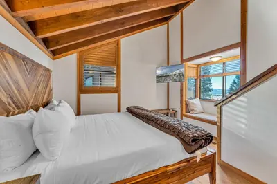 a bedroom with a large bed in a house at Cozy Mountain Retreat in Truckee Near Northstar in Truckee