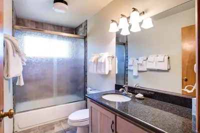 a bathroom with a sink and a shower at The Legacy in Wawona