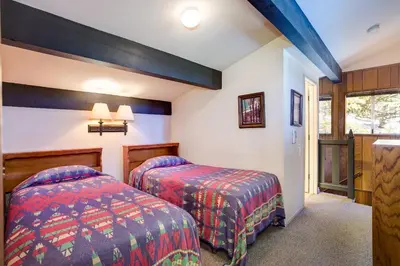 a bedroom with two beds in a room at The Legacy in Wawona