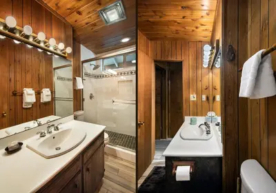 a bathroom with two sinks and a shower at We-Dunn-It in Wawona