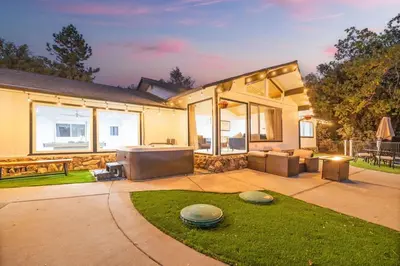 a house with a large living room and a lawn at Hillside Sky Ranch Retreat 12 miles from Yosemite in Oakhurst
