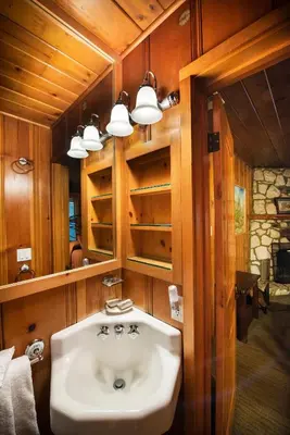 a bathroom with a sink and a mirror at Sugar Pine Suite in Wawona