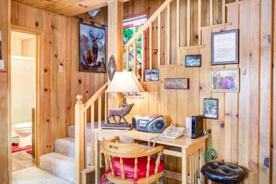 a home office with a desk in a cabin at Cedar Lodge in Wawona