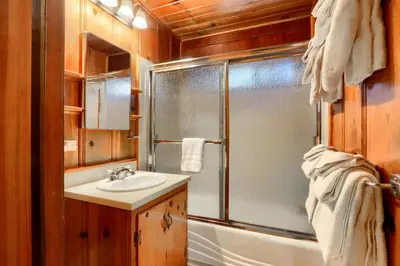a bathroom with a shower and a sink at Walk-A-Bout in Wawona