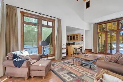 a living room with two couches and a table at 4BR Cabin with Hot Tub – Ultimate Truckee Escape cabin in Truckee