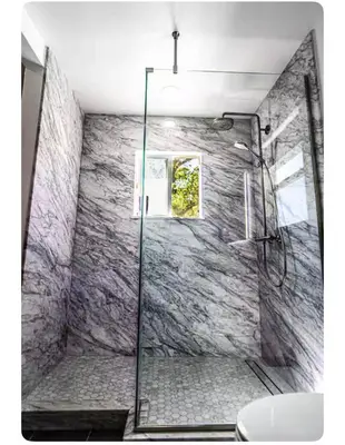 a bathroom with a shower with a glass door at Alta Peak House in Three Rivers